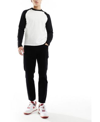 DTT cropped tapered fit cord pants in black