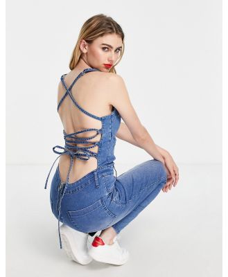 DTT skinny dungaree jumpsuit with tie back in blue