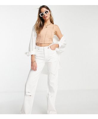DTT Tall straight leg jeans with raw hem and knee rips in white