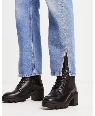 Dune London cleated lace up heeled boots in black