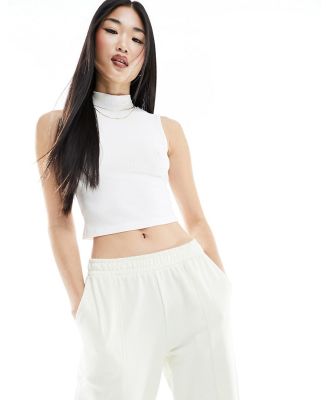 Edited high neck ribbed top in cream-White