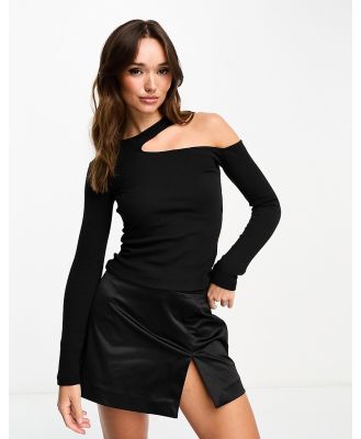 Edited long sleeve cut-out knitted top in black