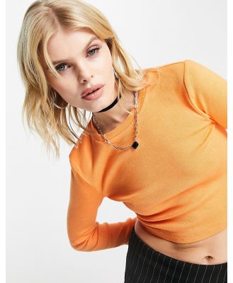 Edited long sleeve fitted top in orange