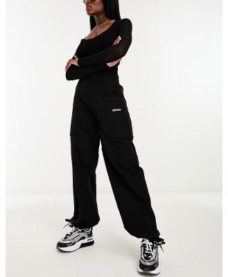 ellesse Corsello track pants in black