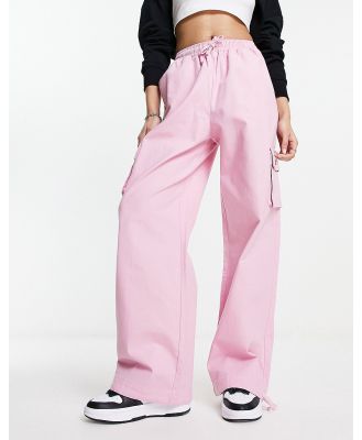 ellesse Trazzal oversized track pants in pink