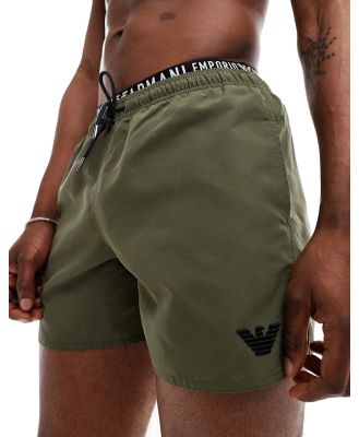 Emporio Armani Bodywear logo waistband swim shorts in khaki-Green