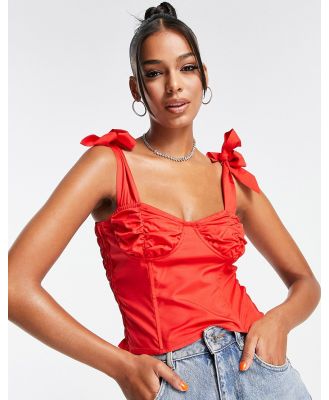 Femme Luxe tie strap corset top in red
