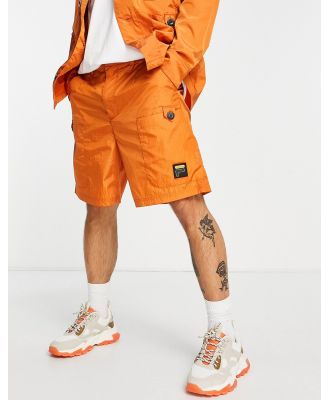 Fila cargo shorts in burnt orange