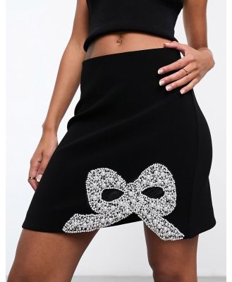 Forever New bow embellished mini skirt in black