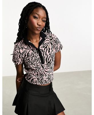 Fred Perry x Amy Winehouse zebra print polo in pink