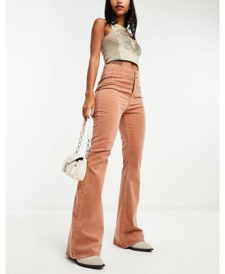 Free People cord high-waisted flare jeans in tan-Brown
