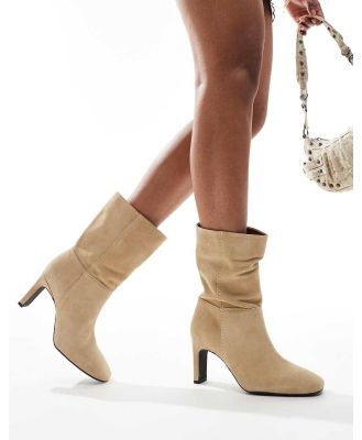 Free People slouchy suede heeled boots in cream-White