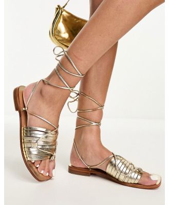 Free People strap detail flat sandals in gold