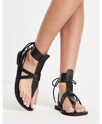 Free People Vacation leather strap detail sandals in black