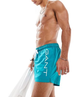 GANT swim shorts with text side logo in blue