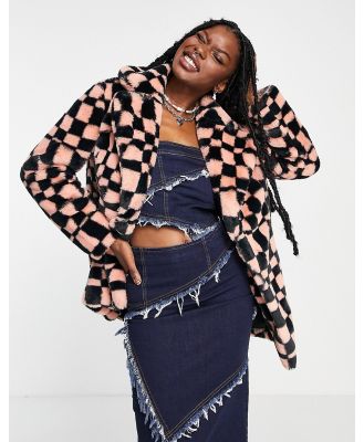 Girlfriend Material faux fur wavy checkerboard print short coat in peach and black-Orange