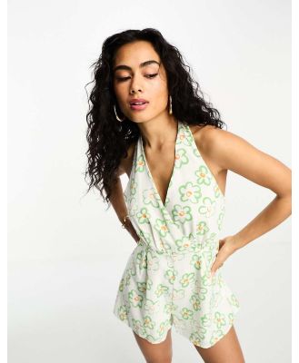 Glamorous halter neck playsuit in white green floral