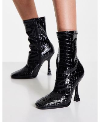 Glamorous heeled sock boots in black croc
