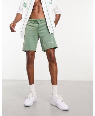 Good For Nothing acid wash jersey shorts in khaki with logo print (part of a set)-Green