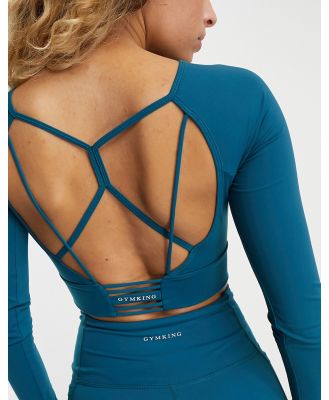 Gym King Dominate strappy open back cropped long sleeve top in blue