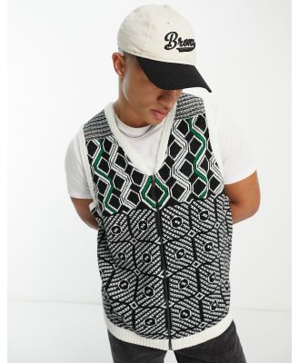 Harry Brown knitted zip through vest in black geo print