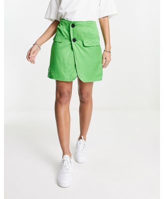Heartbreak button front mini skirt in lime-Green