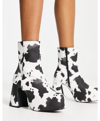 Heartbreak platform heeled ankle boots in cow print-Multi