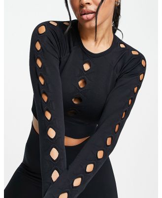 HIIT seamless crop top with cut outs in black