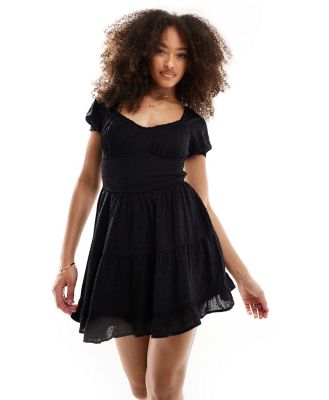 Hollister smocked waist mini dress with pockets and hidden shorts in black