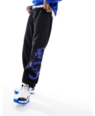 HUF dragon jersey trackies in black with placement prints (Part of a set)