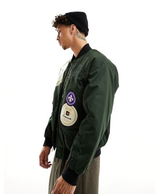 HUF Stratford bomber jacket in dark green with embroidery and badging