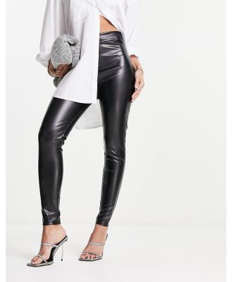 I Saw It First leather look ruched bum leggings in black-White