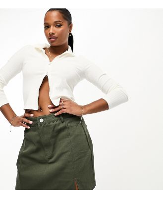 In The Style Petite exclusive split hem denim mini skirt in khaki-Green