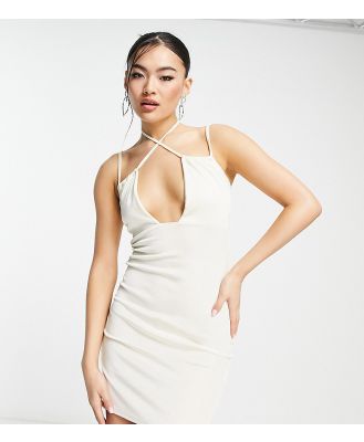 In The Style x Yasmin Devonport exclusive cut out detail mini bodycon dress in cream-White