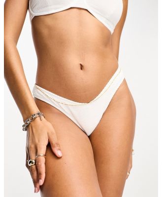 Ivory Rose crinkle v front bikini bottoms in white