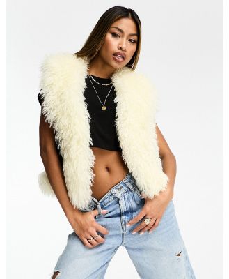 Jayley faux leather shaggy trim vest in black and cream-Multi