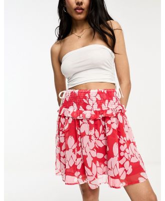 JDY frill detail mini skirt in red and pink floral