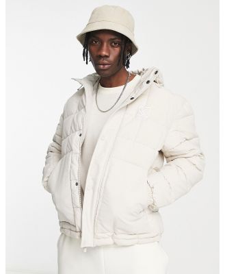 Karl Kani OG quilted puffer jacket in beige-White