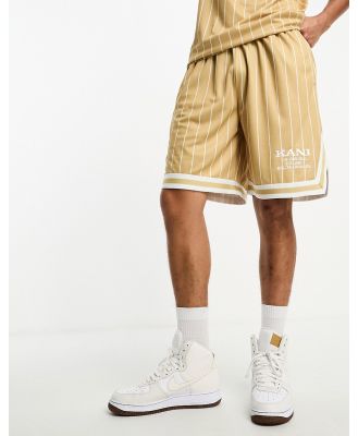Karl Kani retro pinstripe jersey shorts in beige and white (Part of a set)-Neutral