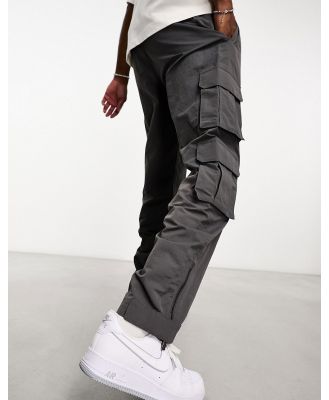 Karl Kani rubber signature cargo pants in washed black-Grey