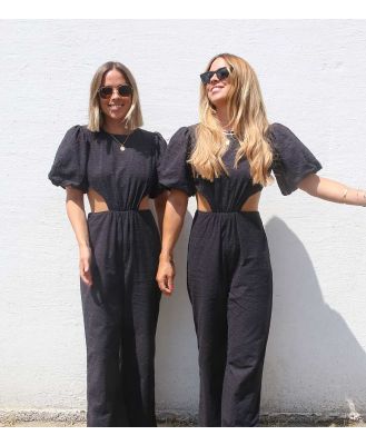 Labelrail x Collyer Twins broderie puff sleeve cut-out detail jumpsuit in black