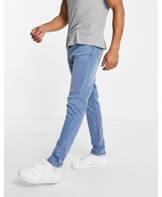 LDN DNM carrot fit jeans in stone washed blue-Neutral