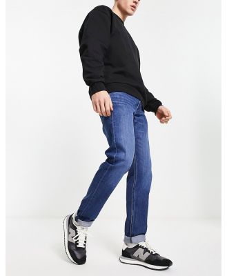 Lee Luke slim tapered fit jeans in mid wash-Blue