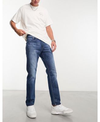 Levi's 502 tapered fit jeans in dark blue wash