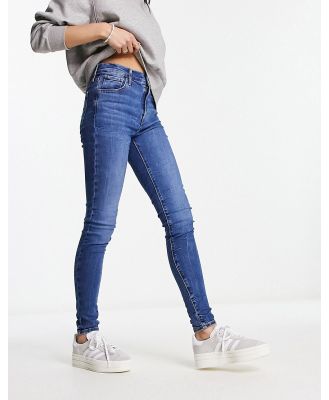 Levi's 720 high rise super skinny jeans in mid wash blue