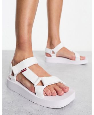 Levi's Cadys low strap sandals in white with red tab logo