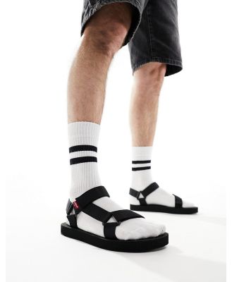 Levi's Tahoe sandals in black with logo