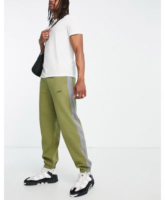 Levi's varsity trackies in olive green with side stripe
