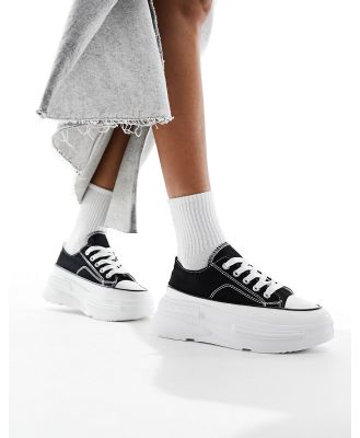 London Rebel canvas lace up sneakers in black