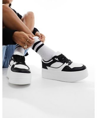 London Rebel chunky panelled flatform sneakers in white and black